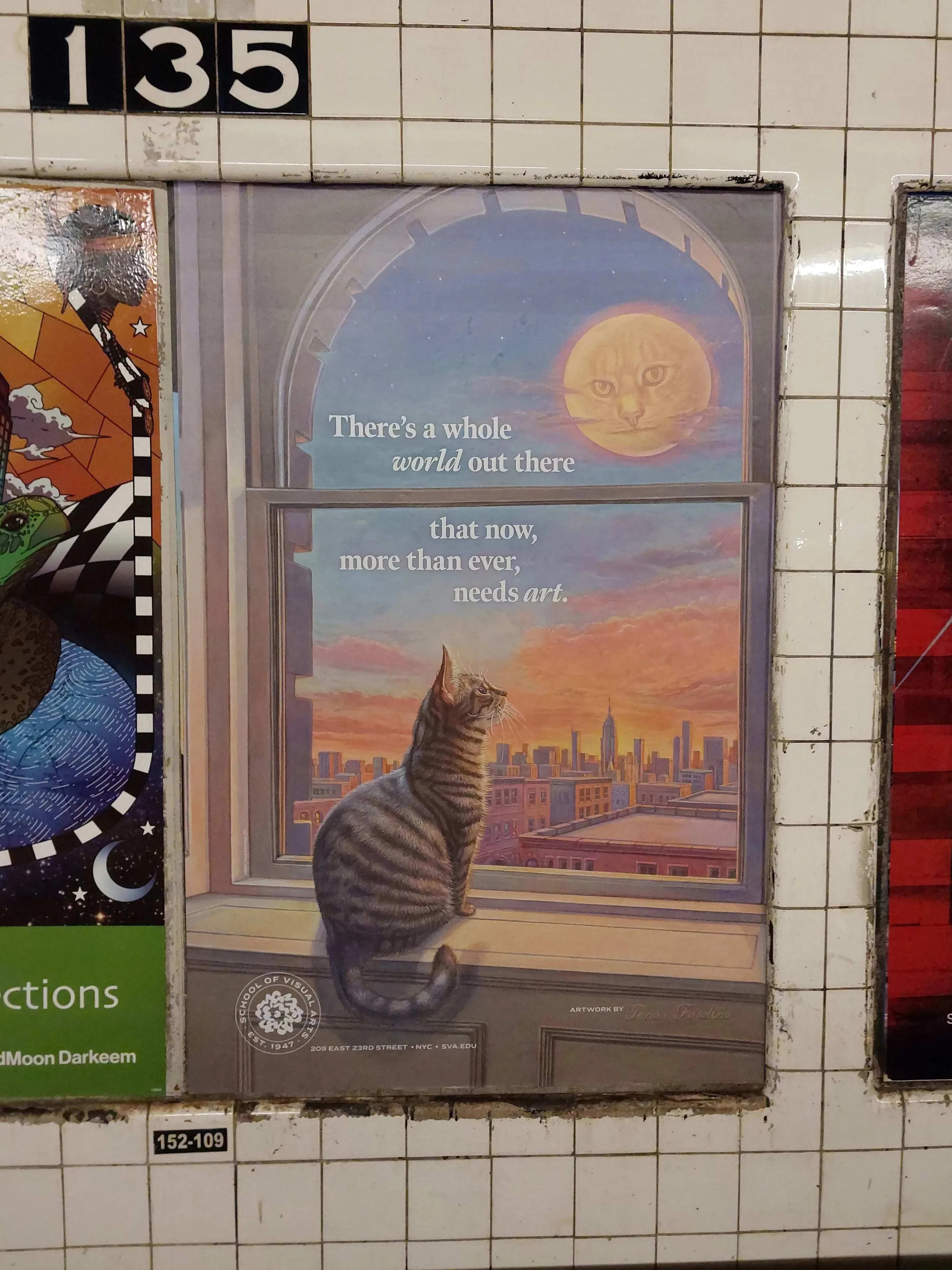  Inside a subway station, vibrant posters of cats and birds adorn the walls, adding charm to the transit space.
