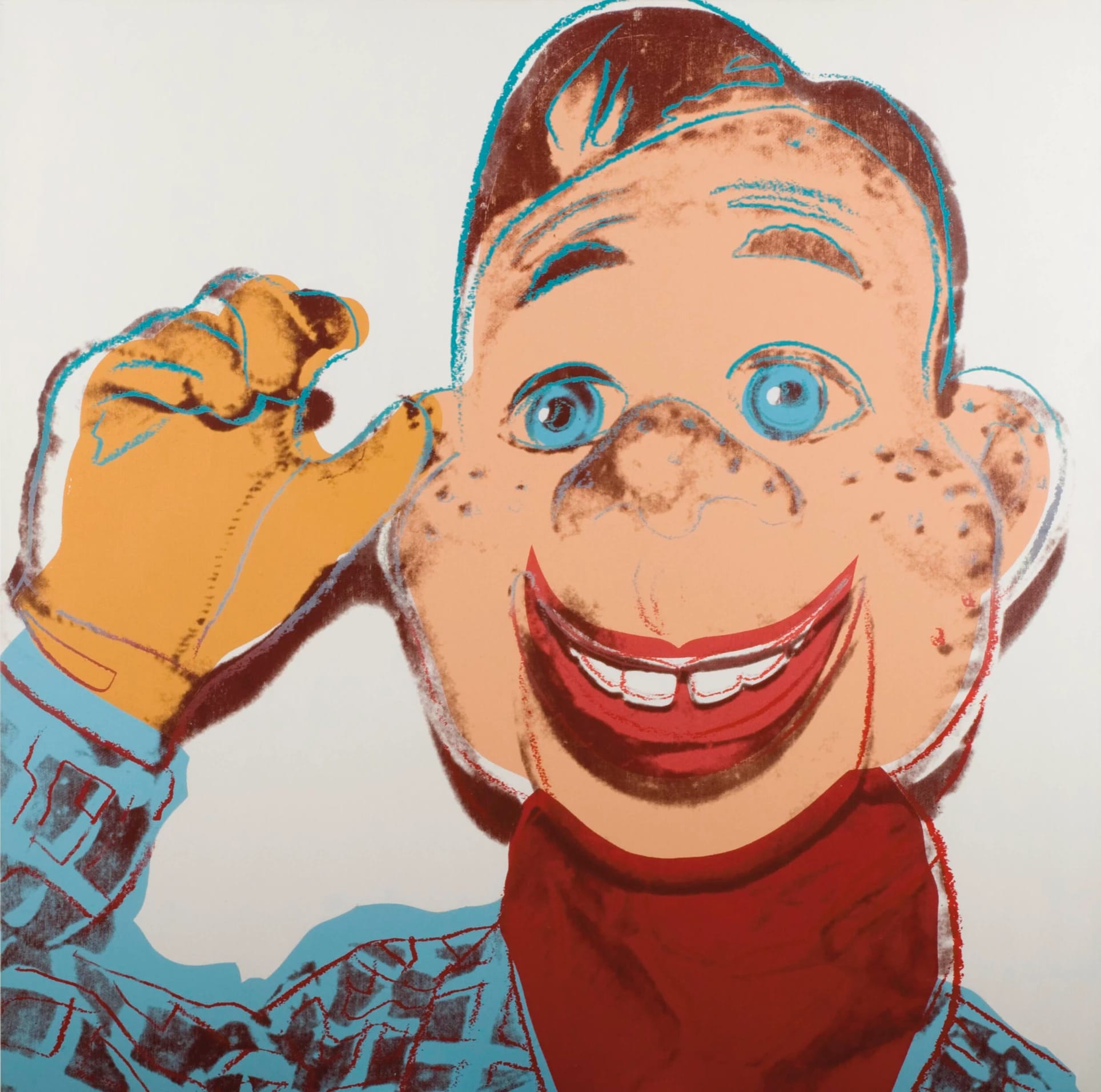 A printed image of a puppet with blue eyes, brown hair, and yellow gloves. His mouth is slightly ajar and smiling.