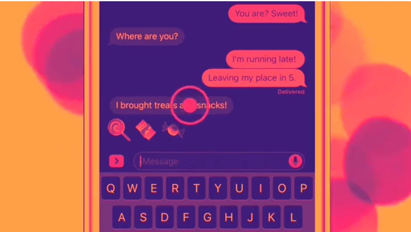An colorful look at at a text message being sent on an iPhone.