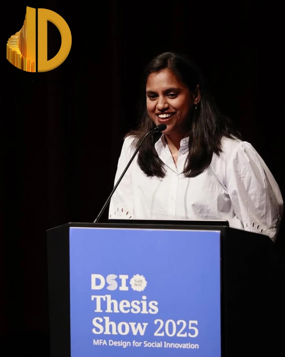 Person speaking at podium with Don Norman Design Award logo in left corner