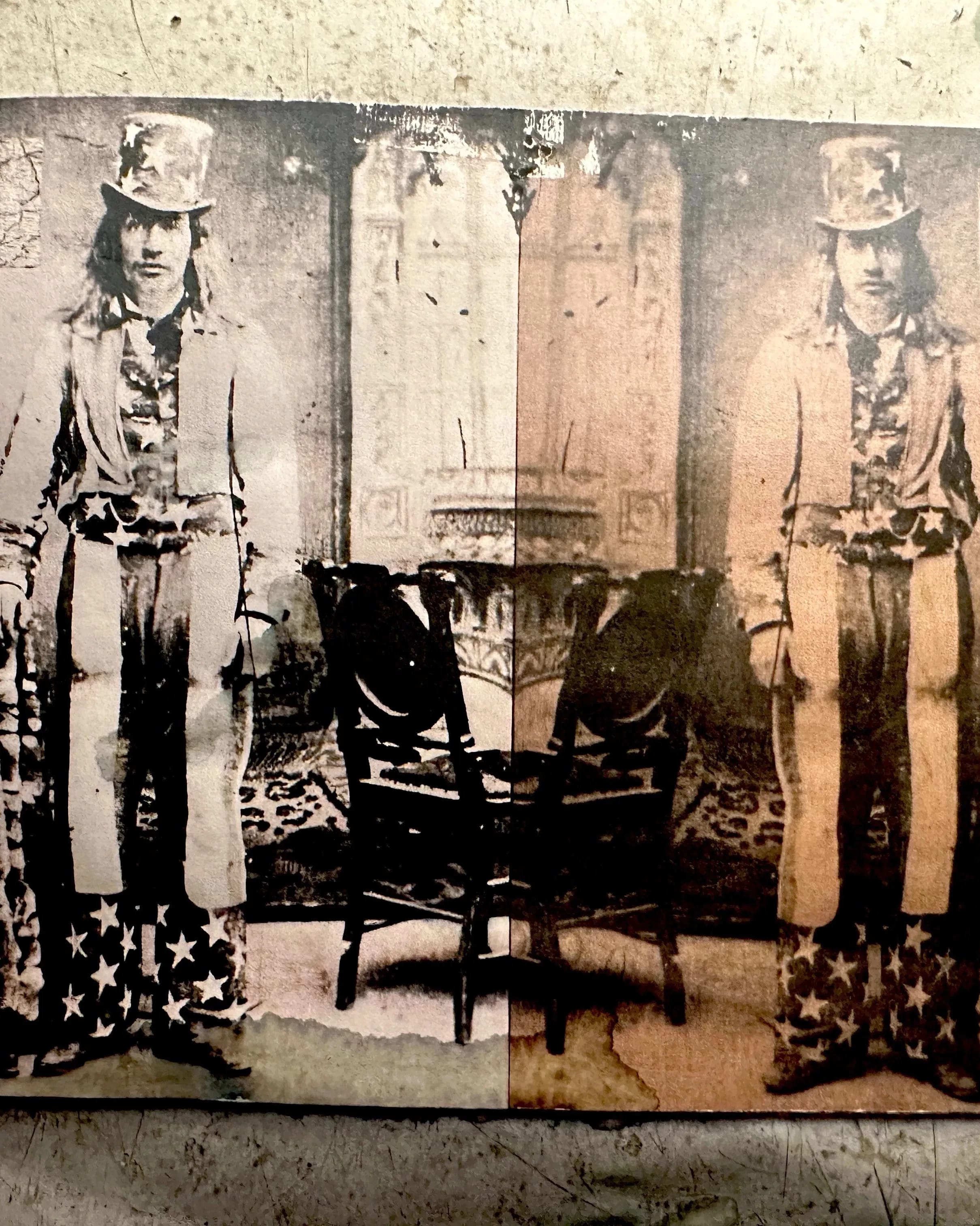 Picture of a mirrored image of a man dressed as uncle sam in black and white and sepia tone.