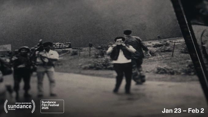 A black and white photograph of men. One seems to be dressed in plainclothes while the others look to be in military gear.