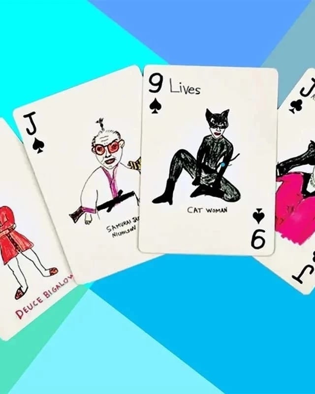 a deck of illustrated cards on a blue, grey, gray and aqua background.